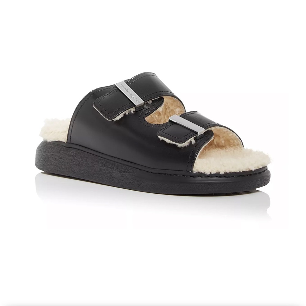 Alexander McQueen shearling slide sandals.